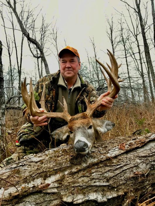 man with trophy buck