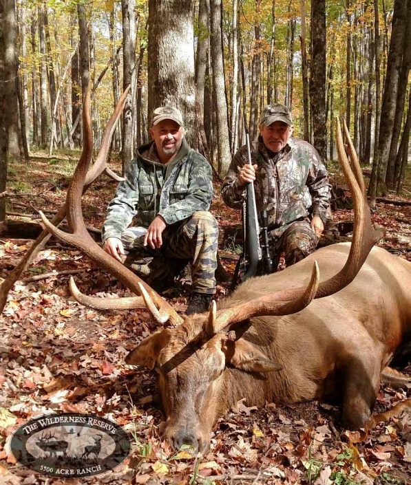 A hunter with an elk 