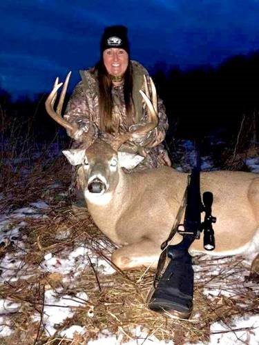 woman with killed deer